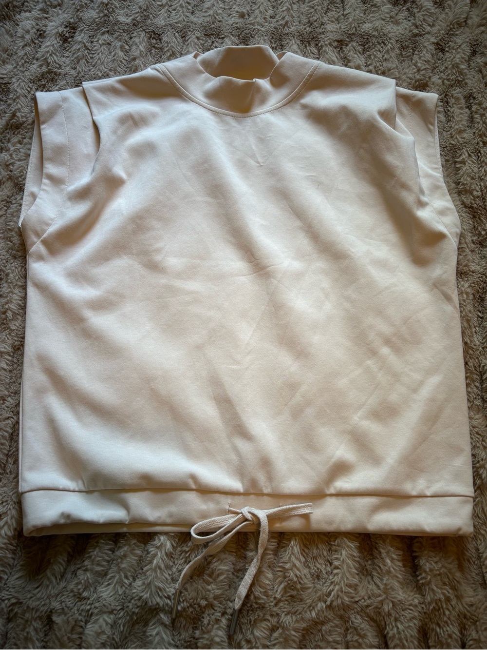 entro Cream Sleeveless Mock Neck Drawstring Top